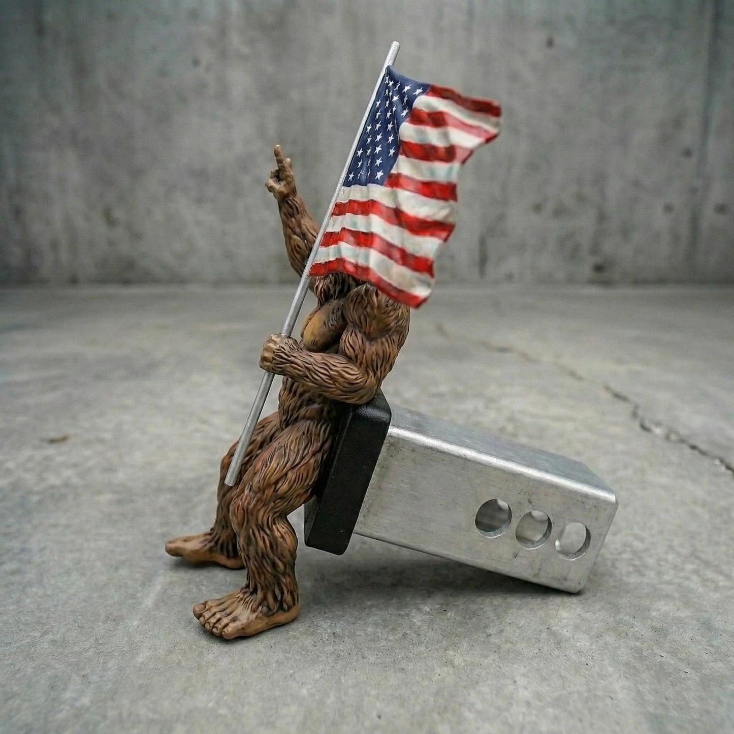 Bigfoot Rock On Hitch Cover with Waving American Flag